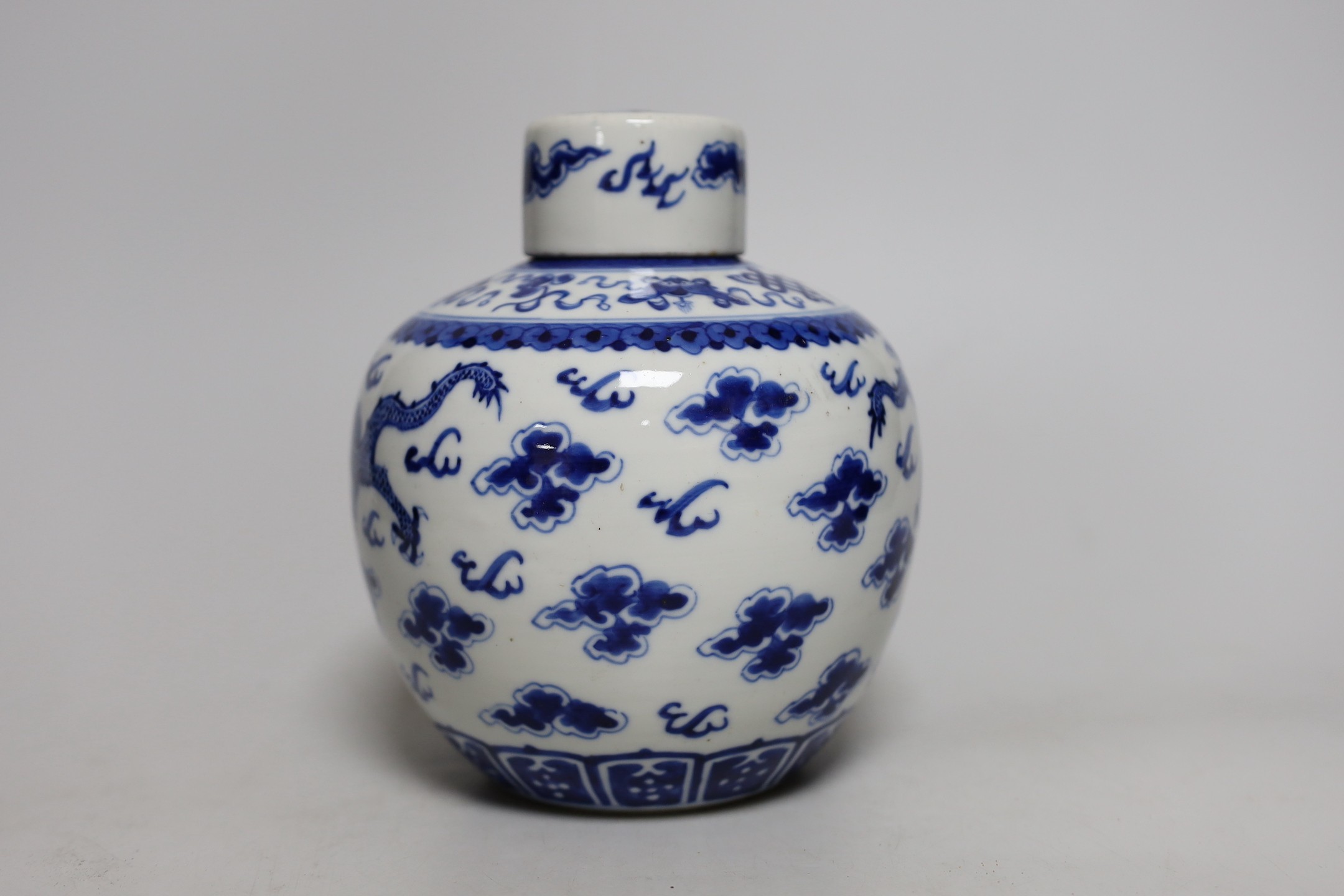 A Chinese blue and white ‘dragon’ jar and cover, 19th century, 18cm tall